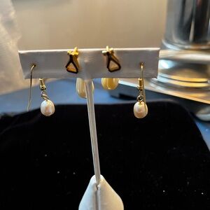 Two pairs of gold pearl drops
One pair is clip on